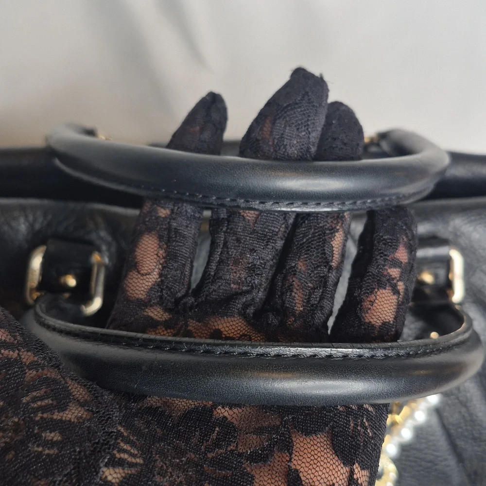 MCM Black Leather Handbag with Gold Accents